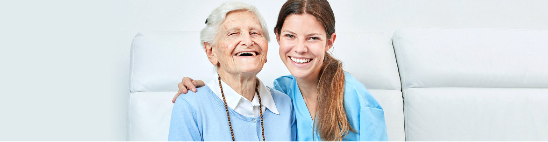 two ladies smiling